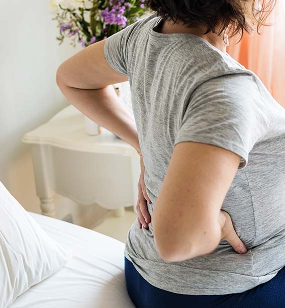 Woman with lower back pain