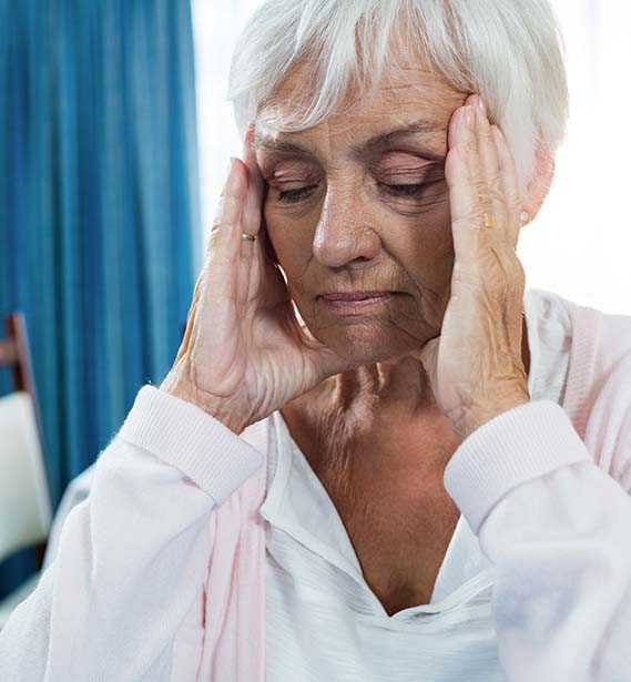 Senior woman headache