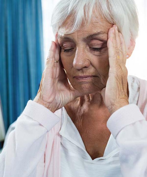 Senior woman headache